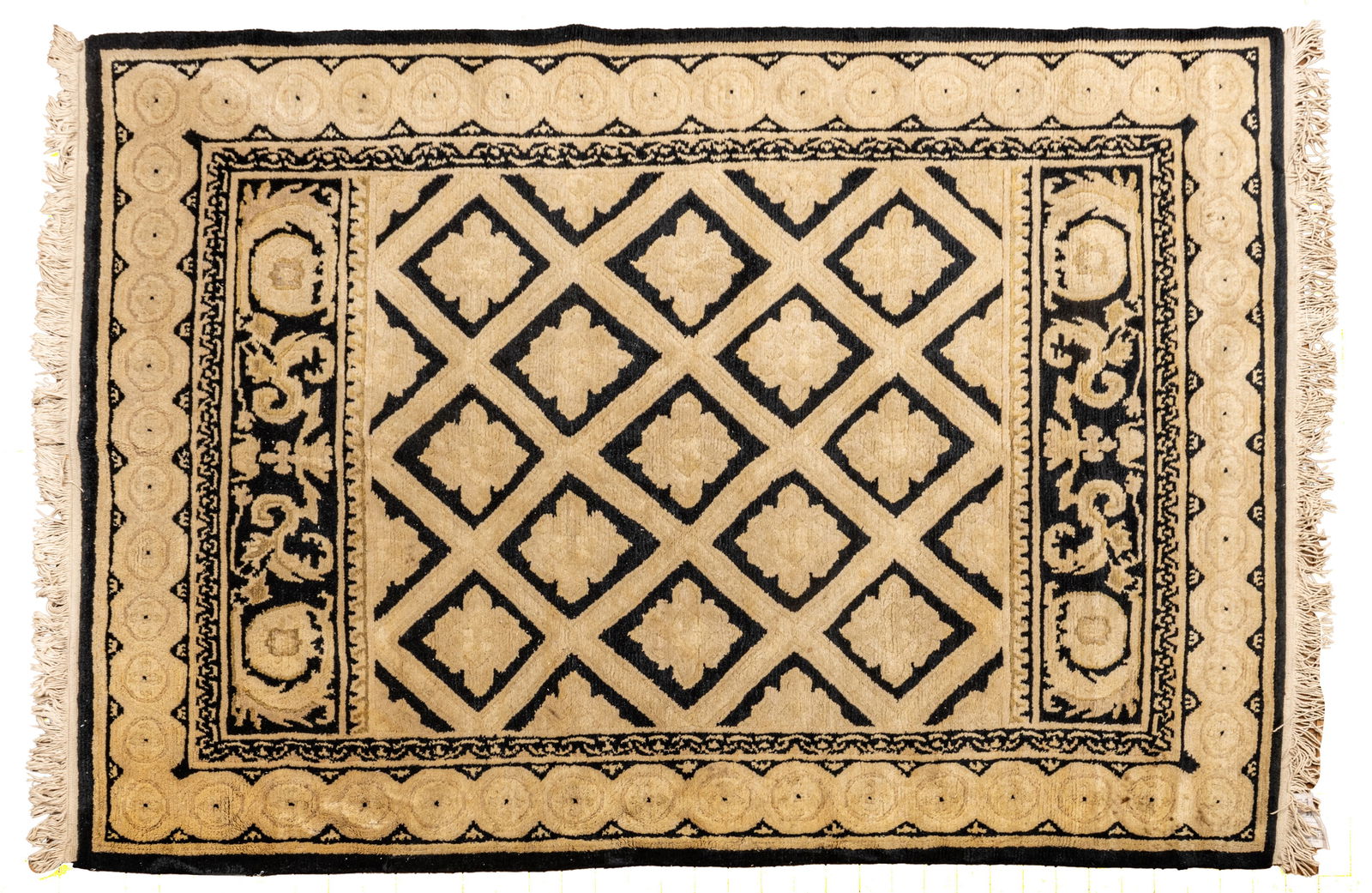 Nepalese Handwoven Wool Area Rug, 1990, W 5' L 7': Nepalese Handwoven Wool Area Rug, 1990, W 5' L 7' Lattice pattern in black and beige. Provenance: Property from the collection of Margarat Weerakoon, Oak Park, MI Dimensions: W 5' L 7'