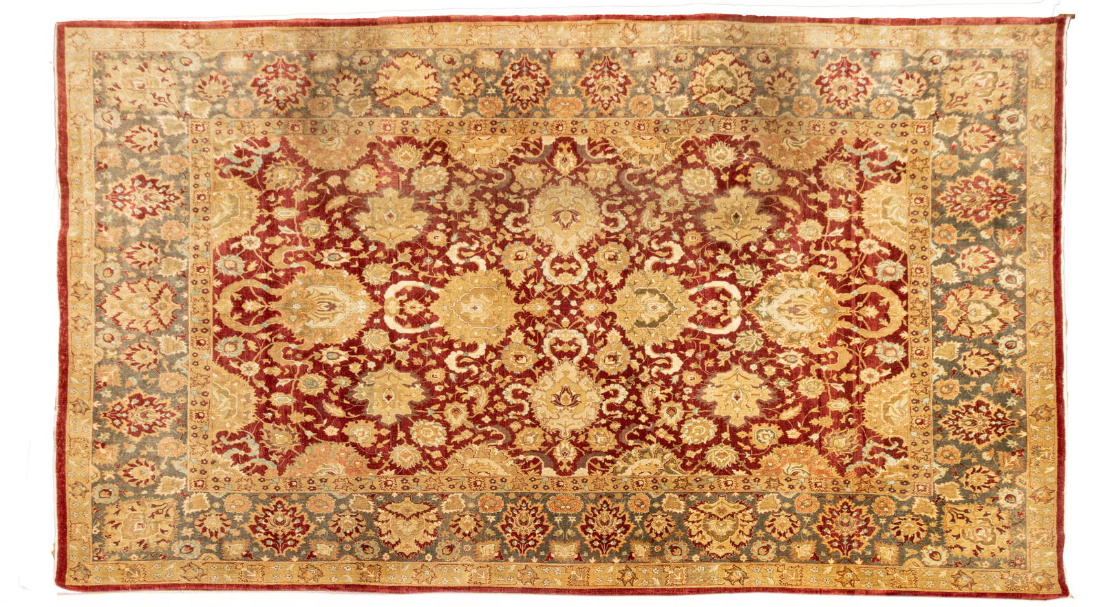 Agra Hand Woven Wool Oriental Rug 1930-1940, W 10' L 14' 6": Agra Hand Woven Wool Oriental Rug 1930-1940, W 10' L 14' 6" Having an elaborate leafy vine and flower blossom design on burgundy red center field. Pale green border comprised of blossoming flowers and