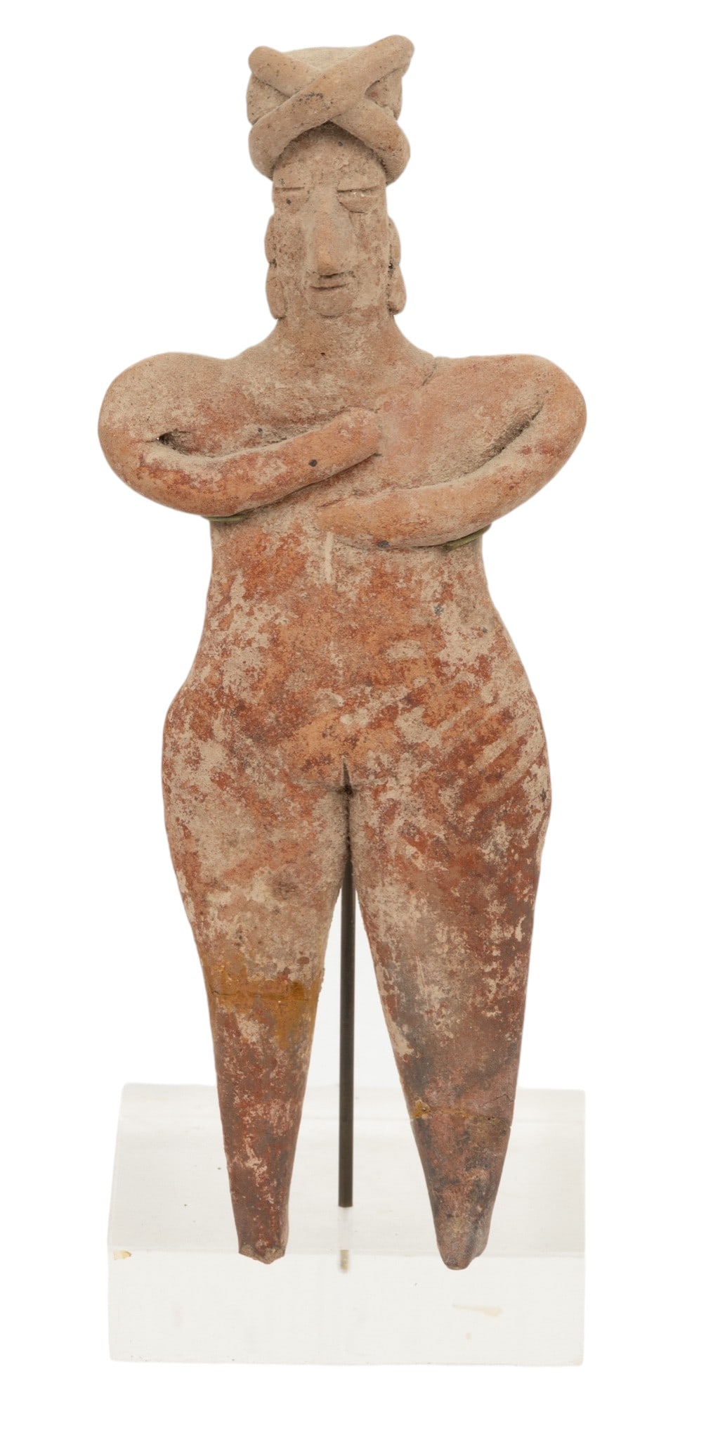 Colima Pre-Columbian Terra Cotta Flat Standing Female Figure: Colima Pre-Columbian Terra Cotta Flat Standing Female Figure Female figure with arms crossed over chest on stand. Figure depicted with a headdress and earrings. Provenance: Purchased from the E