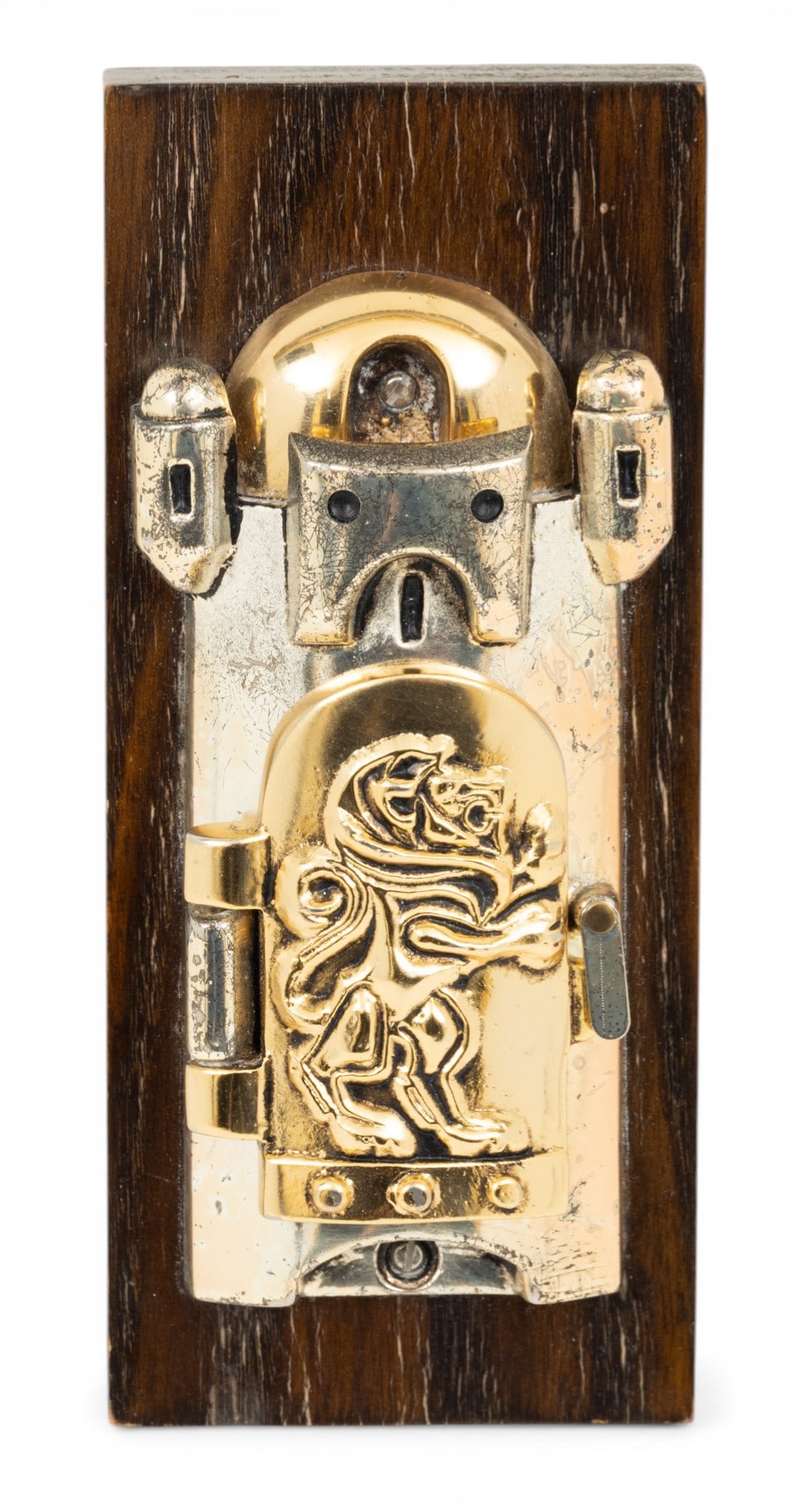 Frank Meisler (Israeli, 1929-2018) Judaica Metal Mezuzah on Wood H 4.5" W 2.2" 1 PC: Frank Meisler (Israeli, 1929-2018) Judaica Metal Mezuzah on Wood H 4.5" W 2.2" 1 PC Signed on verso "Frank Meisler and Israel". Wood back 6" x 2.4". Hinged door opens to visible parchment. Prove