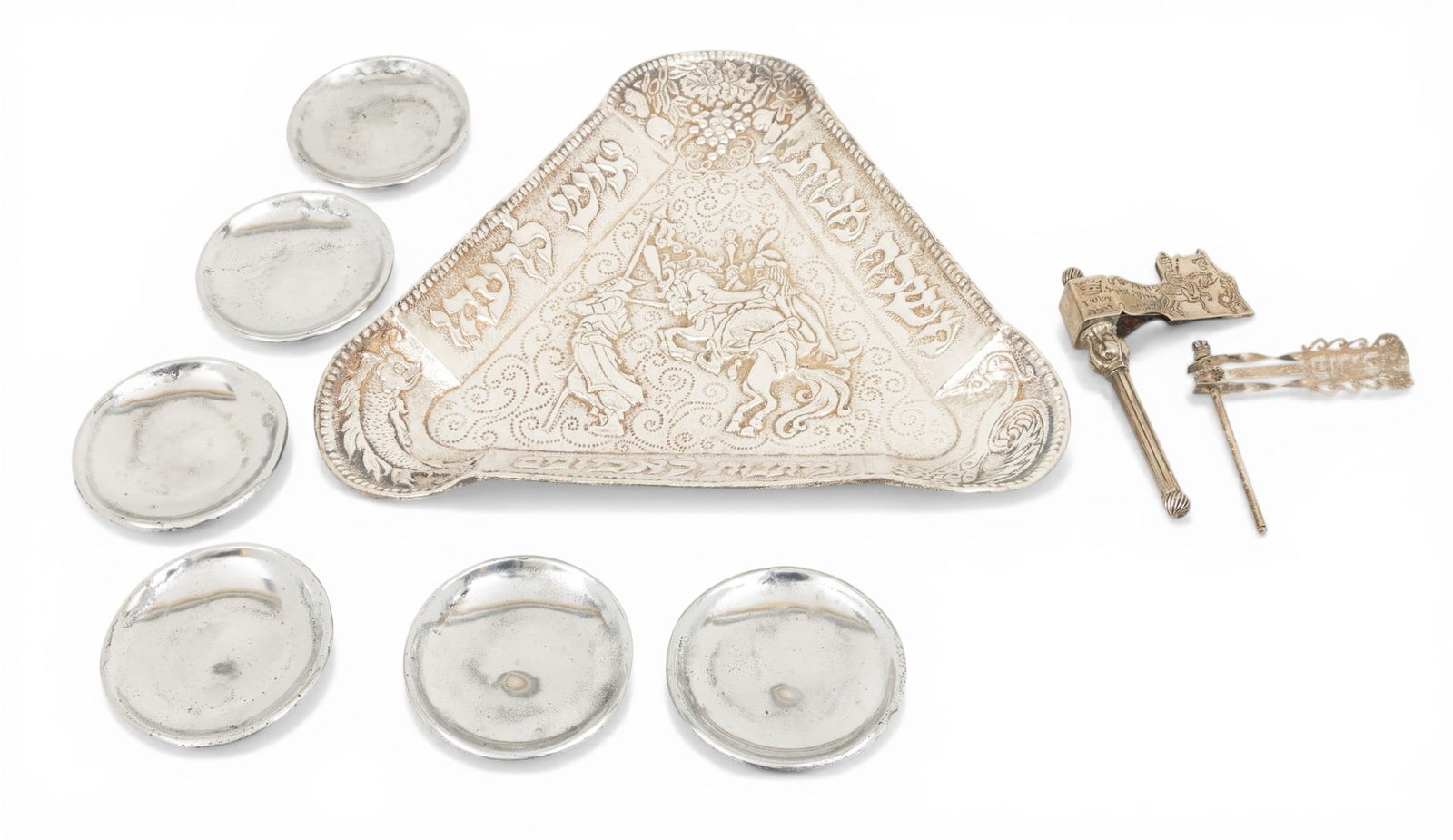 Hamantaschen Judaica Silver Plate Triangular Tray, + 2 Hand Held Purim Groggers 3 PCS: Hamantaschen Judaica Silver Plate Triangular Tray, + 2 Hand Held Purim Groggers 3 PCS Purim Grogger is a traditional Jewish noisemaker to celebrate the holiday of Purim. Hamantaschen tray is a Seder p
