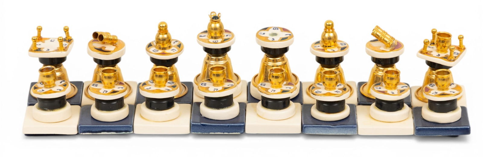 Eran Grebler, Judaica Ceramic Blue and White Spinning Menorah H 2.2" W 3" L 12" 1 PC: Eran Grebler, Judaica Ceramic Blue and White Spinning Menorah H 2.2" W 3" L 12" 1 PC Hand made in Israel. Signed by artist. Provenance: Property of a Troy, MI private collector Dimensions: H 2.