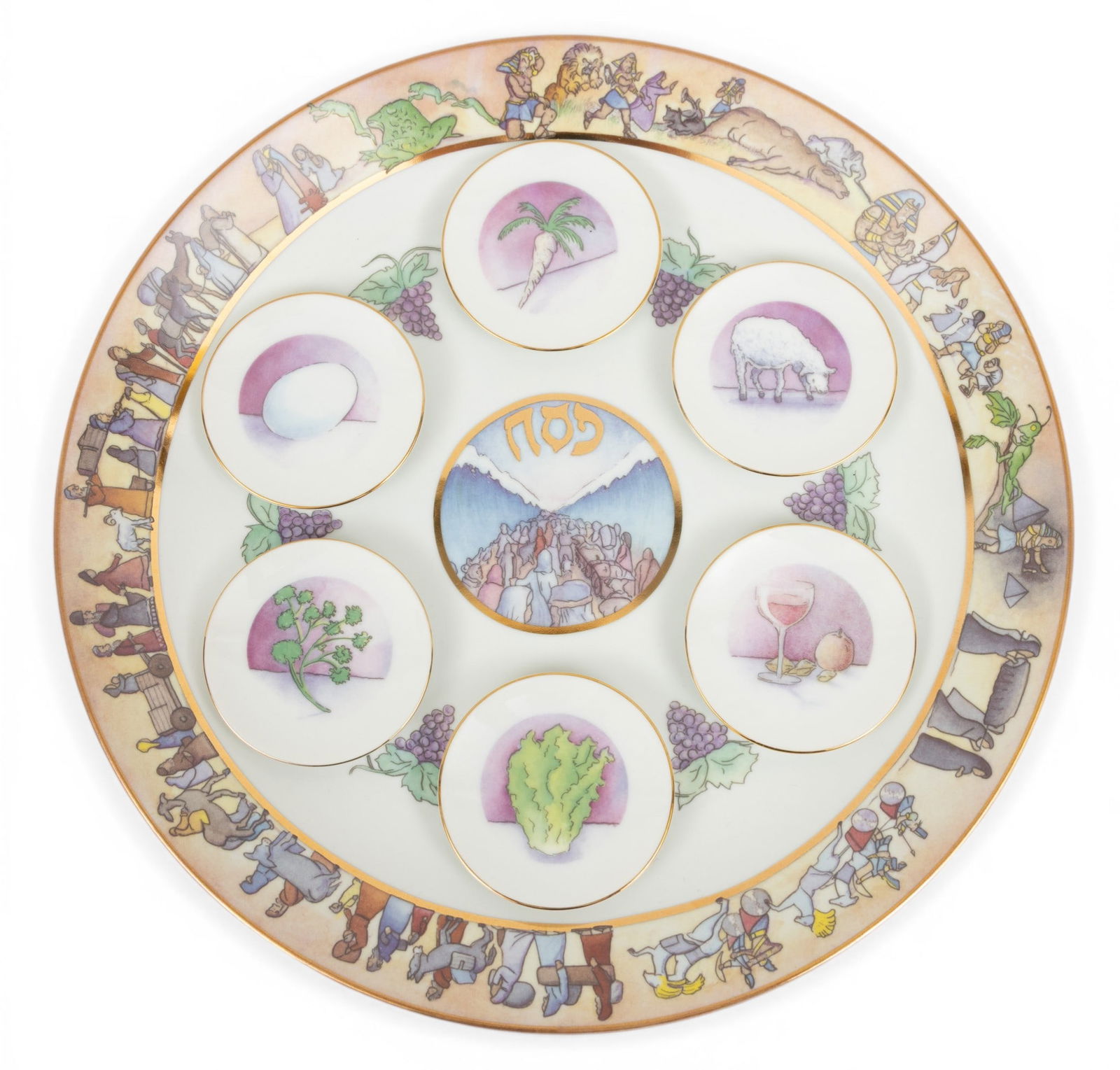 Judaica Porcelain Seder Plate + 6 Small Plates 1991, 'Exodus', Dia. 14" 7 PCS: Judaica Porcelain Seder Plate + 6 Small Plates 1991, 'Exodus', Dia. 14" 7 PCS Aviv Judaica Imports by Robin Hall and Rich Sigerman. Six individual plates 3.2". All have gold edges. Provenance: