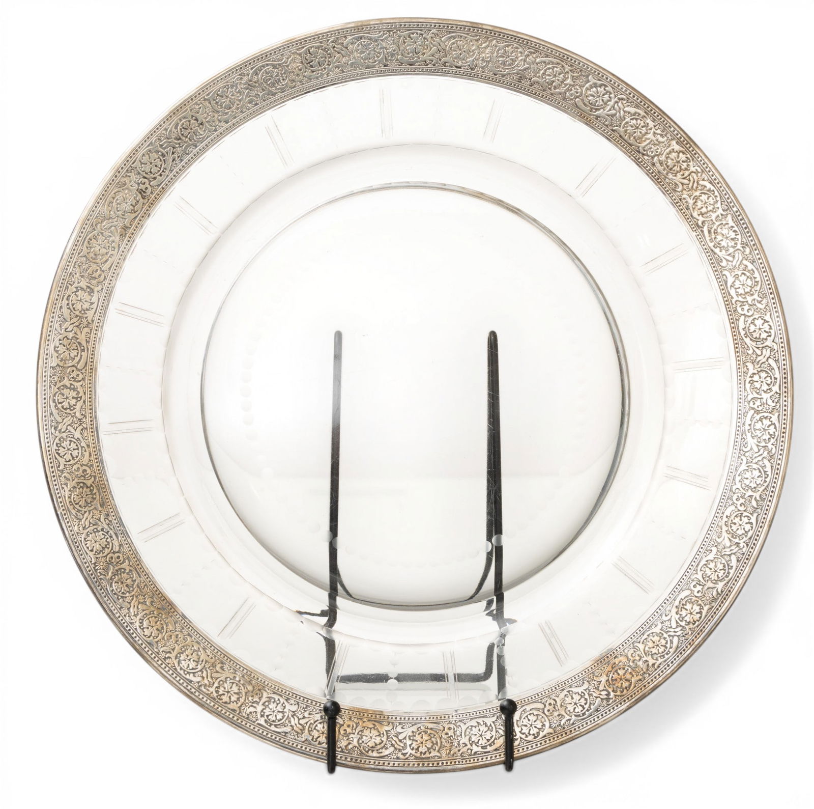 Sterling Overlay Charger H 1" Dia. 14": Sterling Overlay Charger H 1" Dia. 14" Large glass charger having scrolled sterling silver overlay around edge and circular etched patterns. Dimensions: H 1" Dia 14"