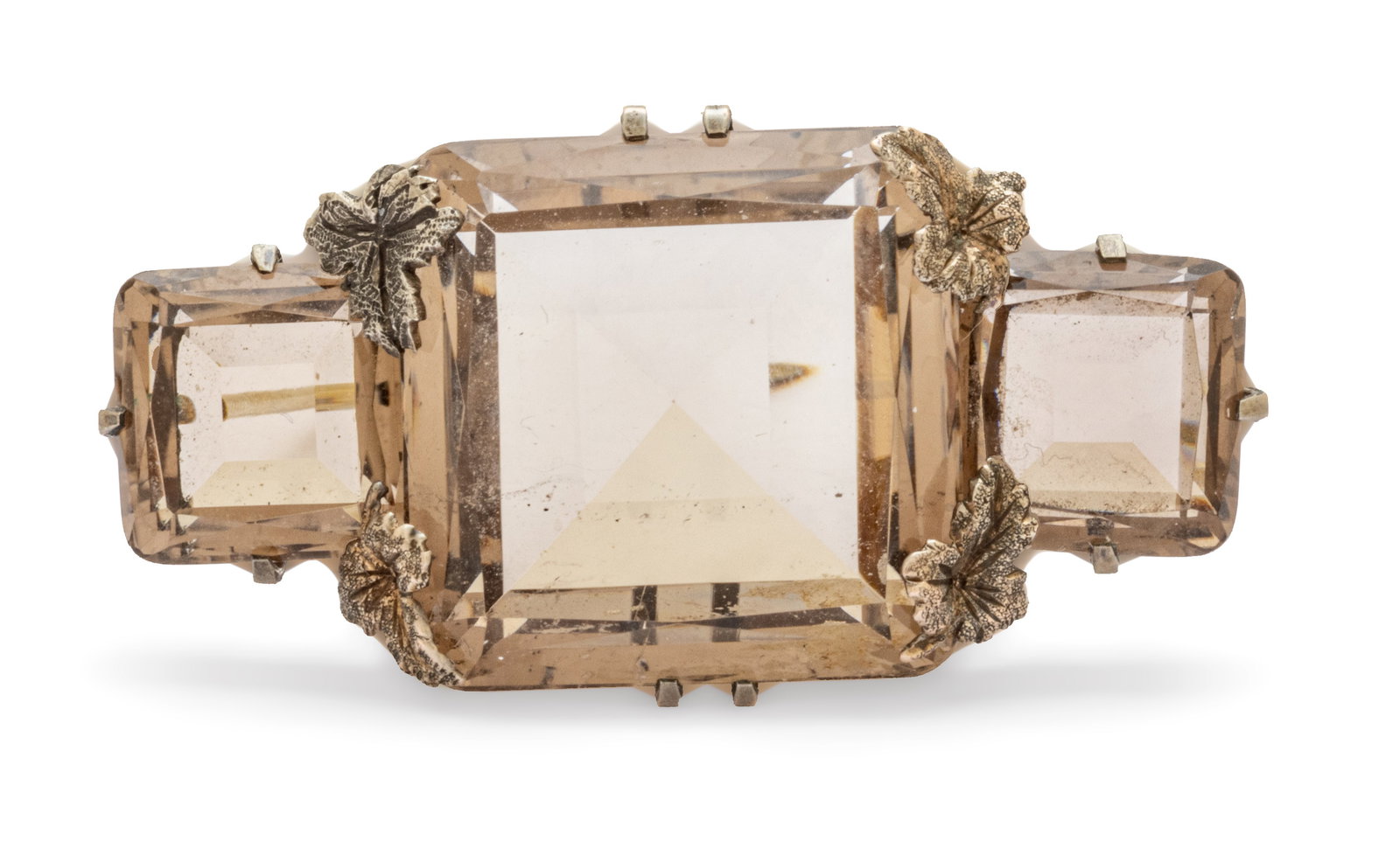 Smoky Quartz and Silver Brooch 1900, 19 g: Smoky Quartz and Silver Brooch 1900, 19 g vintage brooch. Largest stone is 22 x 23mm. Two smaller stones are 12 x 12mm. Dimensions: 19 g