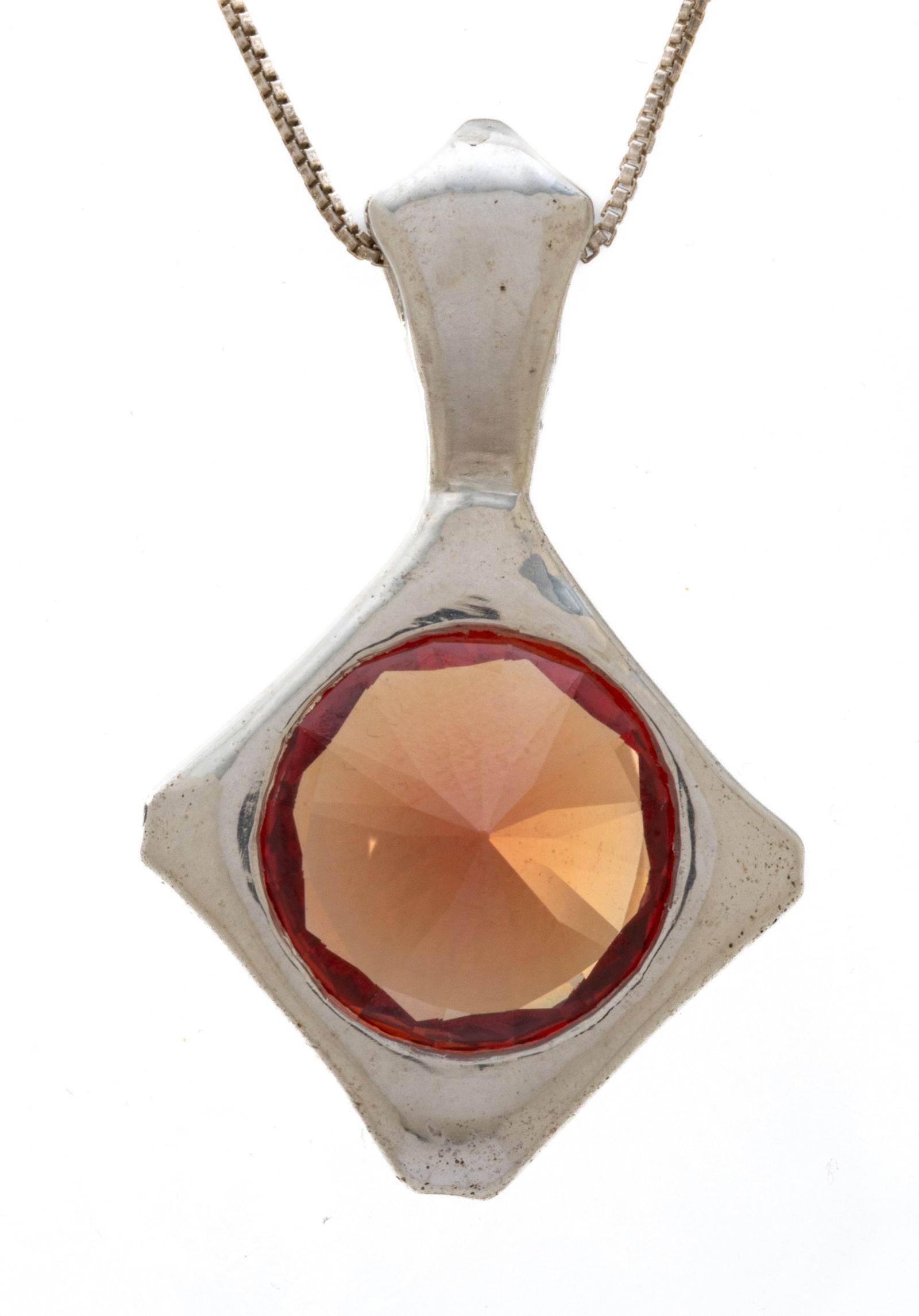 Synthetic Sapphire, 15 Carat Kaleidoscope Cut, Sterling Chain L 10.5" 18 g: Synthetic Sapphire, 15 Carat Kaleidoscope Cut, Sterling Chain L 10.5" 18 g 15.47carats. Orange. 15.85 x 15.9 x 8.87mm. GIA certificate. Sterling chain is 18" long. Dimensions: L 10.5" 18 g