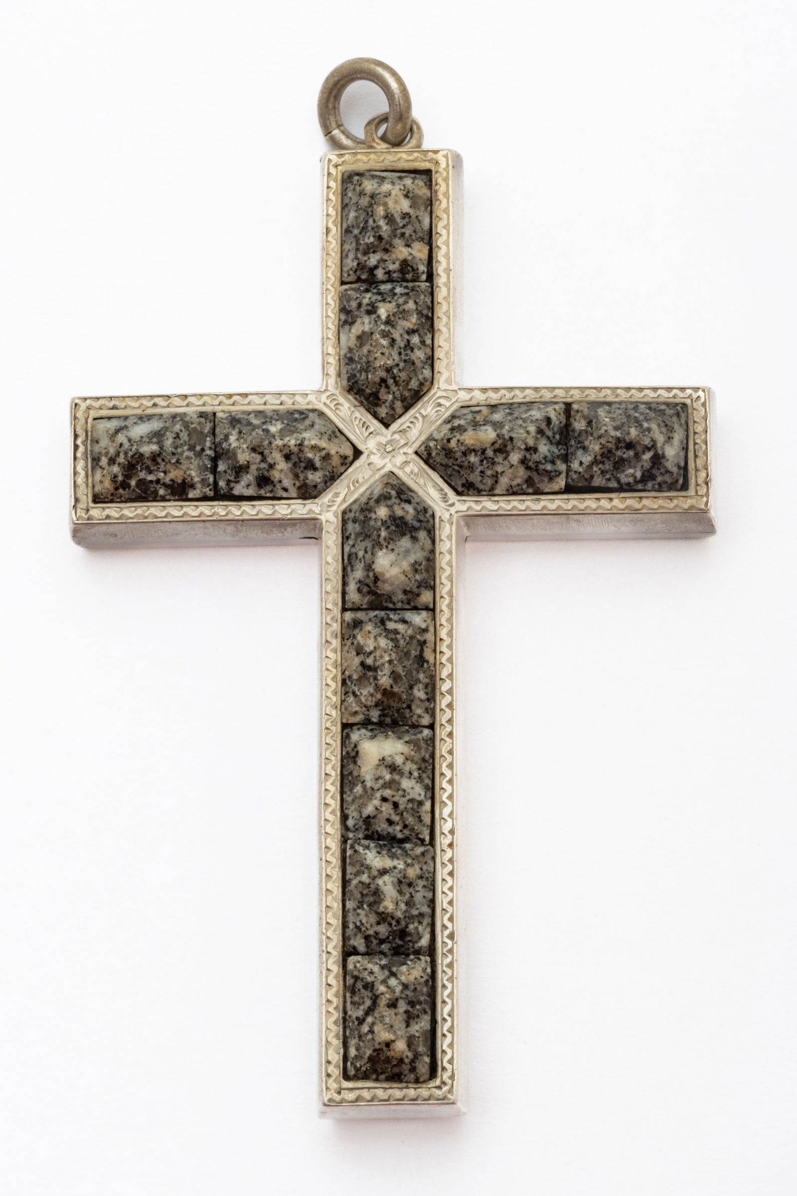 Silver Cross 1900, H 3" W 2" 30 g 1 PC: Silver Cross 1900, H 3" W 2" 30 g 1 PC Inset with stones. Hand chased verso. No silver content marks. Dimensions: H 3" W 2" 30 g 1 PC