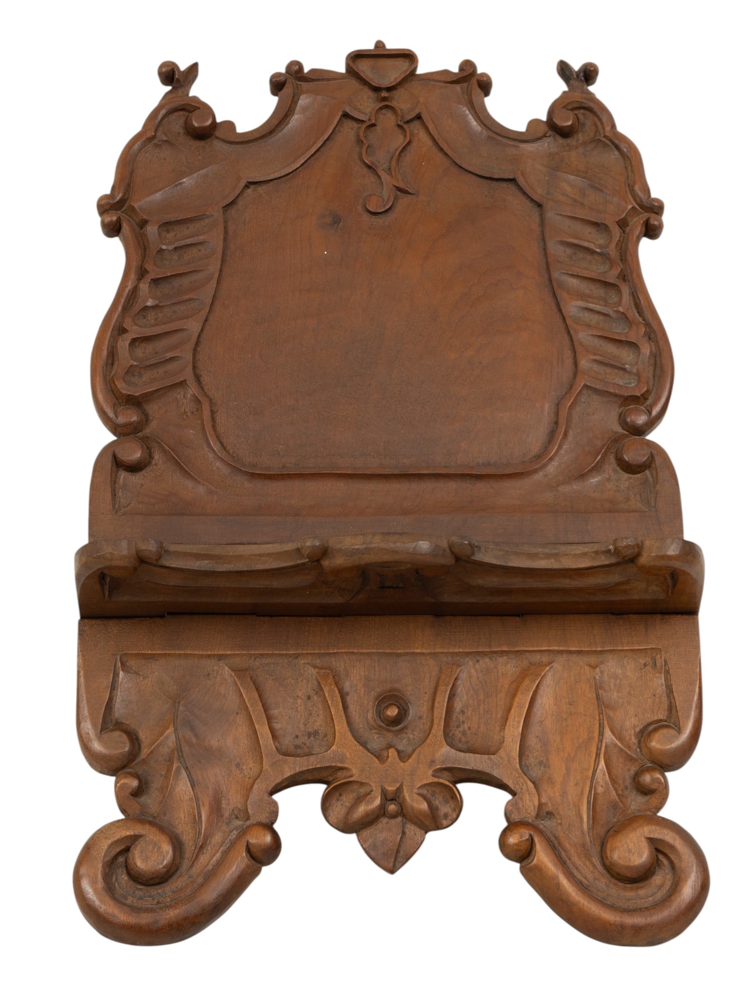 Carved and Sculpted Walnut Bookstand, 20th C., H 12.25" W 11" Depth 14": Carved and Sculpted Walnut Bookstand, 20th C., H 12.25" W 11" Depth 14" Caved and sculpted walnut with organic scrolling leaf accents. Collapsible via a central hinge. Provenance: Property from