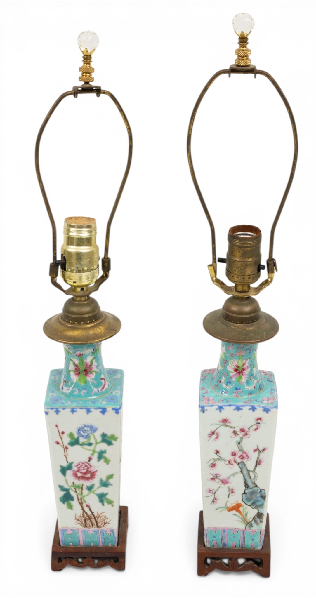 Chinese Export Famille Rose Vases As Lamps H 23.5" W 3" L 3" 1 PAIR: Chinese Export Famille Rose Vases As Lamps H 23.5" W 3" L 3" 1 PAIR Two Chinese famille rose porcelain vases converted as lamps having floral designs and carved wooden bases and faceted crystal finial