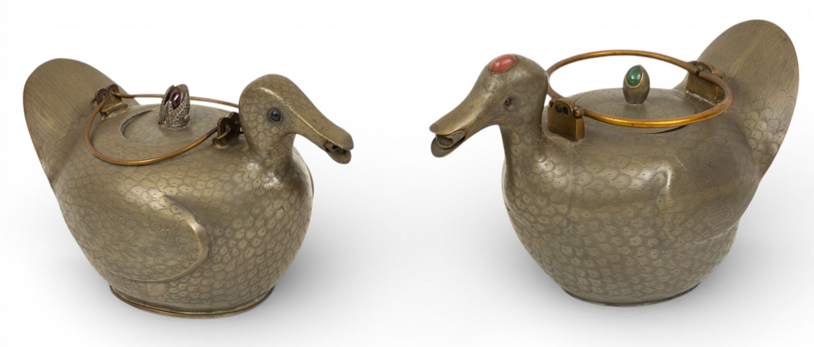 Chinese Pewter and Brass Figural Teapots 19th.c., 'Ducks', H 4.5" L 8" 2 PCS: Chinese Pewter and Brass Figural Teapots 19th.c., 'Ducks', H 4.5" L 8" 2 PCS Finely chased pewter feathers with brass beak and handle. Hardstone inset within clasped web feet adorn lid. Interior pewte
