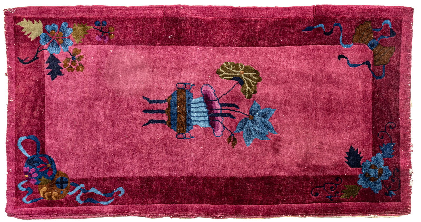 Chinese Hand Woven Wool Mat, Plum Color 1920, W 24" L 47" 1 PC: Chinese Hand Woven Wool Mat, Plum Color 1920, W 24" L 47" 1 PC Deep pile. Two shades of purple with urn at center. Provenance: Property of a Troy, MI private collector Dimensions: W 24" L