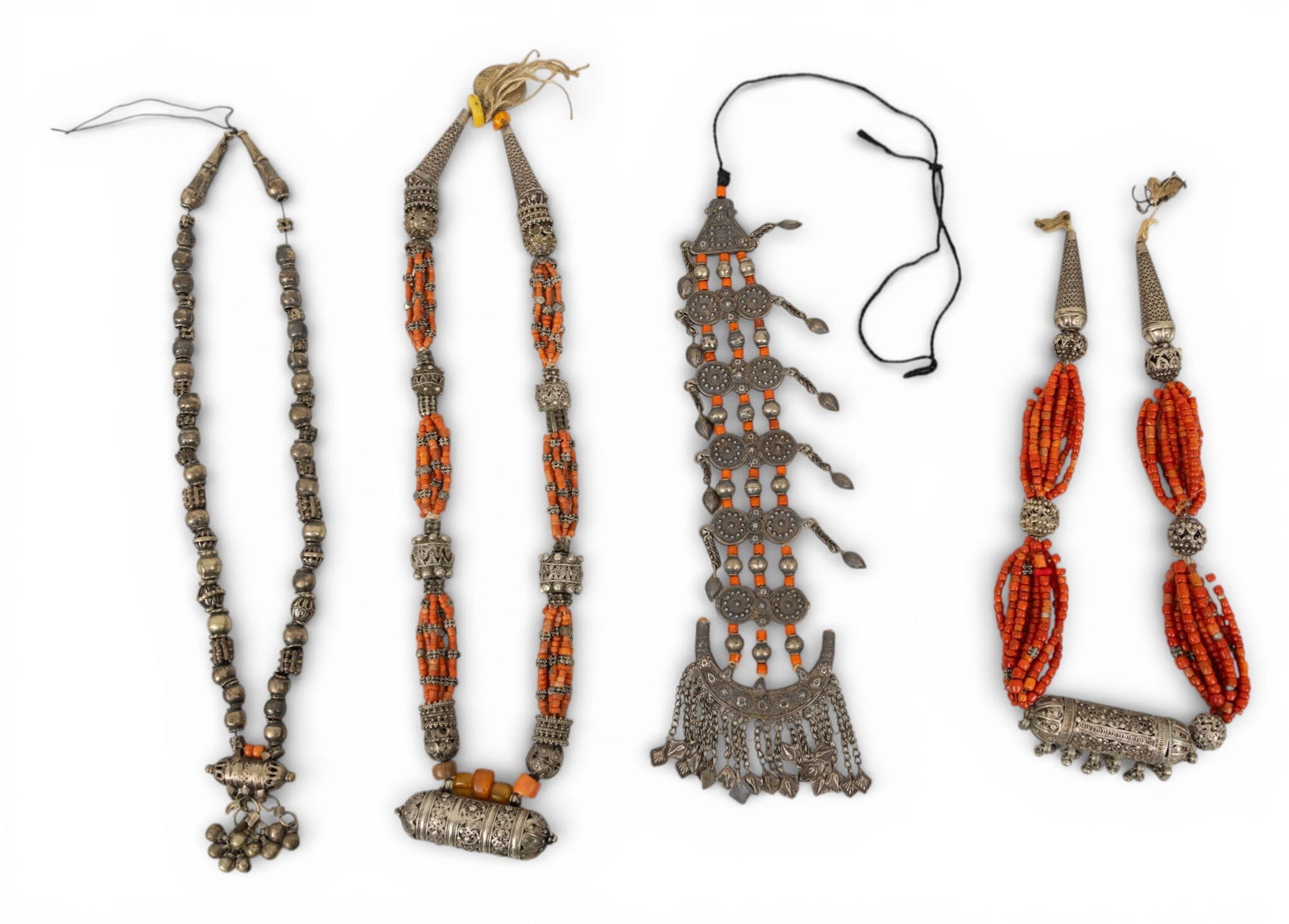 Yemeni Four Coral and Silver Beaded Necklaces 4 PCS: Yemeni Four Coral and Silver Beaded Necklaces 4 PCS Four Yemeni necklaces having coral and silver beads. Various lengths. Provenance: Property from a Midland, MI private collector Dimensions: N