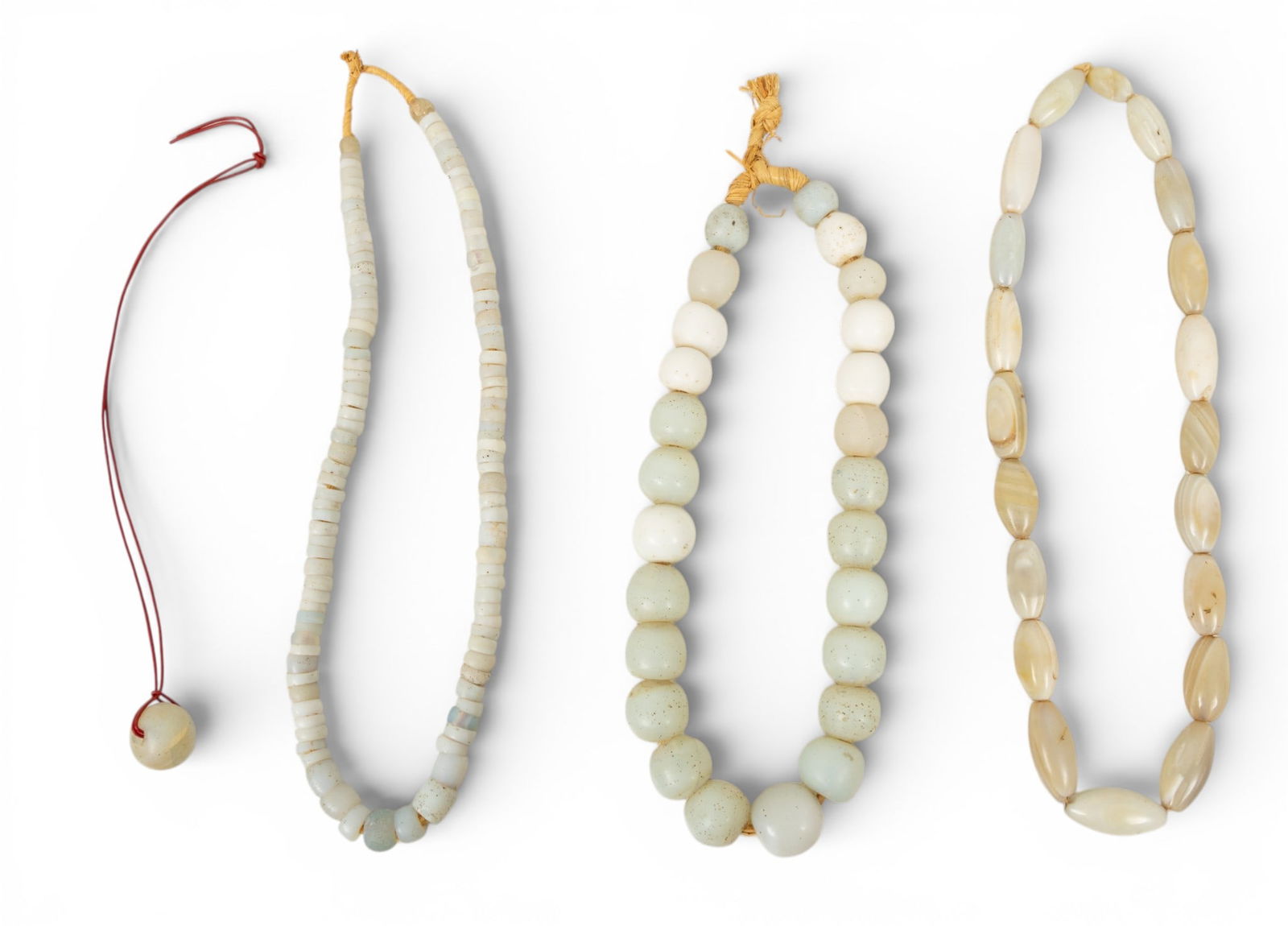 Four Large Glass Trade Bead Necklaces L 24" 4 PCS: Four Large Glass Trade Bead Necklaces L 24" 4 PCS Four trade bead necklaces having large glass beads. Provenance: Property from a Midland, MI private collector Dimensions: Necklaces L 24" 4 PCS