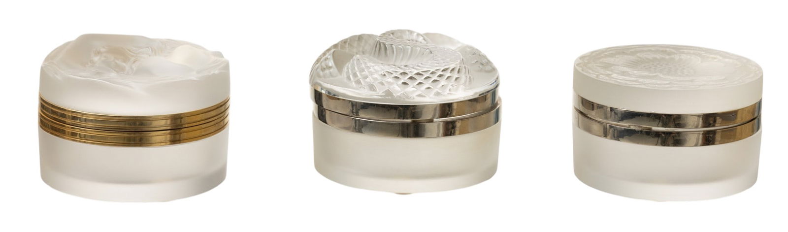 Lalique (France) Three Frosted Art Glass Powder Boxes 20th Cent., H 2" Dia. 3" 3 PCS: Lalique (France) Three Frosted Art Glass Powder Boxes 20th Cent., H 2" Dia. 3" 3 PCS "Dahne", Serpent, and floral hinged lid powder boxes. All signed on undersides. Provenance: Property of a Troy, MI