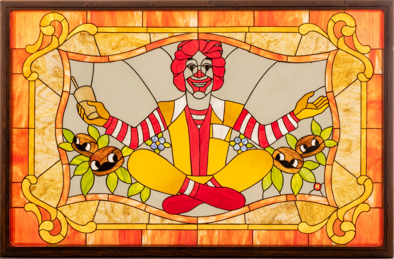 McDonald's Mansard Era Leaded Stained Glass Window 1970 - 1980, 'Ronald McDonald', H 46" W 70.25": McDonald's Mansard Era Leaded Stained Glass Window 1970 - 1980, 'Ronald McDonald', H 46" W 70.25" Depth 4" A large leaded, stained-glass window in a heavy oak shadowbox frame, featuring a central imag