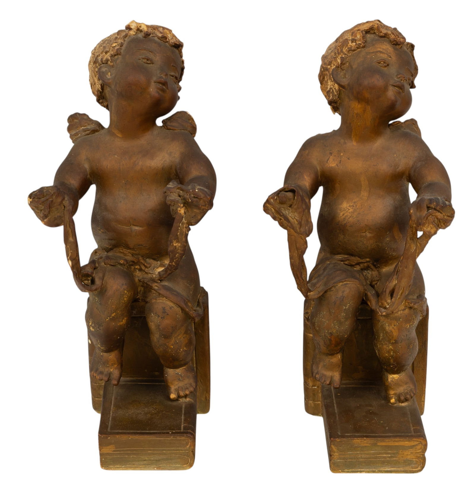 Chalk and Wax Cherub Bookends, Gilded 1860, H 15" W 7" 1 PAIR: Chalk and Wax Cherub Bookends, Gilded 1860, H 15" W 7" 1 PAIR Used as display at Henri Bendel store in Dearborn Dimensions: H 15" W 7" 1 PAIR