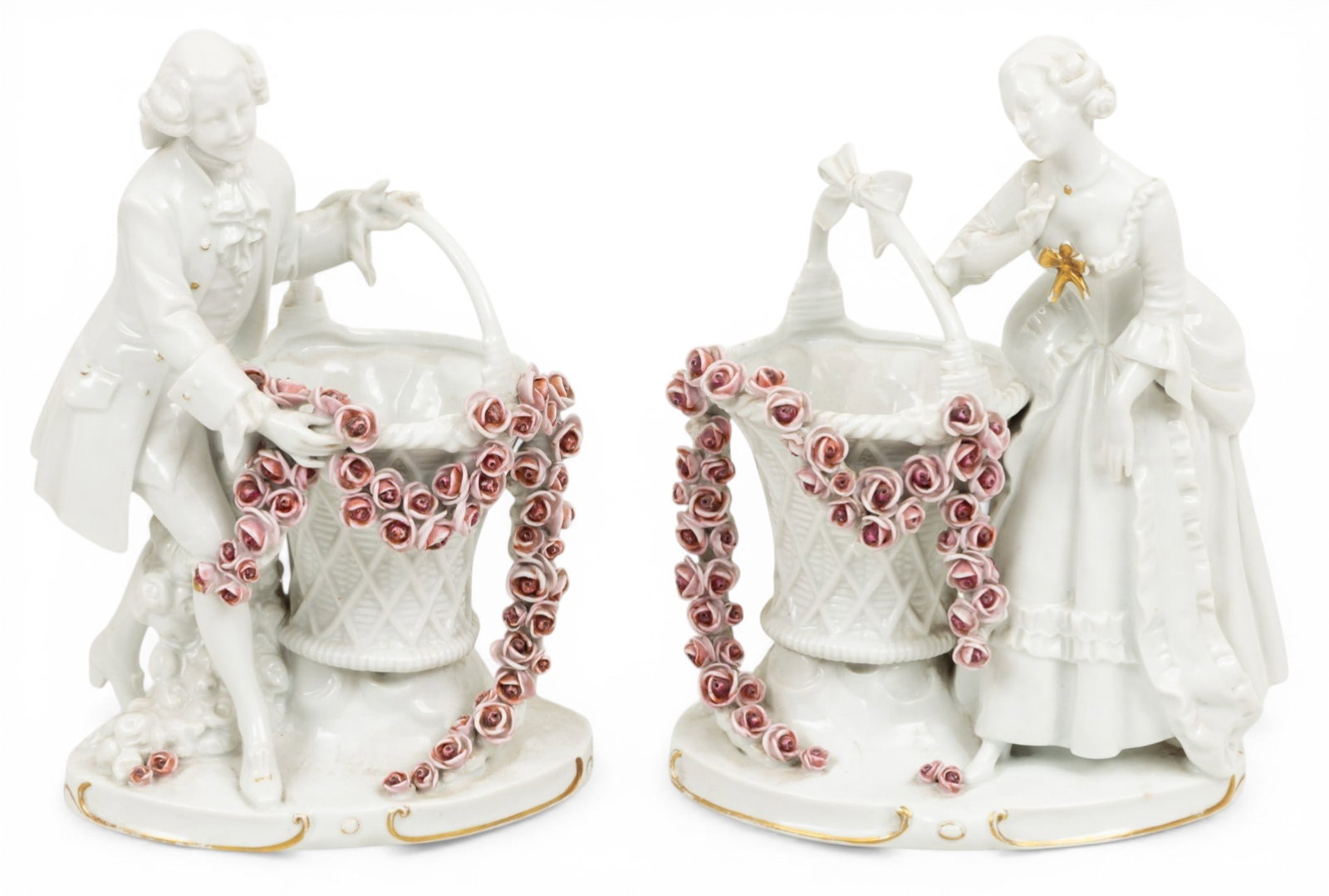 German Porcelain Figural Flower Holders, Ca. 1920-1940, H 12" W 8" Depth 6" 2 PCS: German Porcelain Figural Flower Holders, Ca. 1920-1940, H 12" W 8" Depth 6" 2 PCS Unmarked German porcelain flower holders. In the form of a gentleman and lady standing next to woven baskets draped wi
