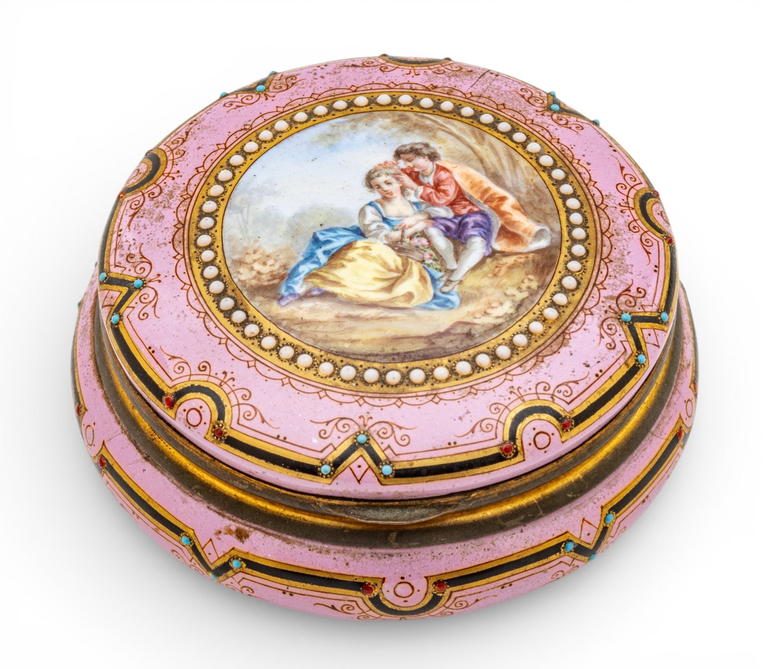 French Enamel Covered Box 18th.c., 'Pink Border, Courting Scene', H 1.2" Dia. 3": French Enamel Covered Box 18th.c., 'Pink Border, Courting Scene', H 1.2" Dia. 3" Round with loose cover (originally hinged). Center courting scene after Fragonard surrounded by raised white enam