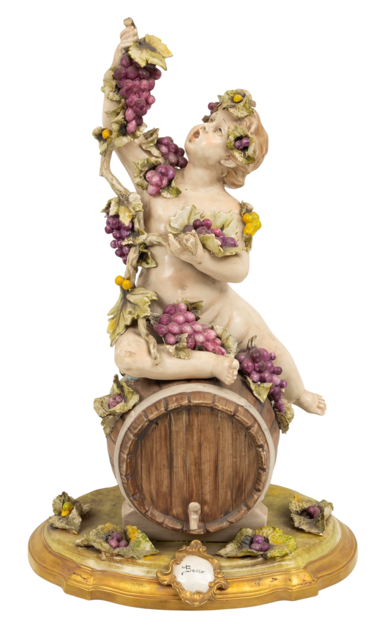 Italy, Capodimonte Porcelain Bacco or Bacchus on Wine Barrel Sculpture 1900, H 27" W 18" 1 PC: Italy, Capodimonte Porcelain Bacco or Bacchus on Wine Barrel Sculpture 1900, H 27" W 18" 1 PC Fired gold rim at base. "Mitellero a villa" impressed. Also Capodimonte trademark. Hand sculpted and hand