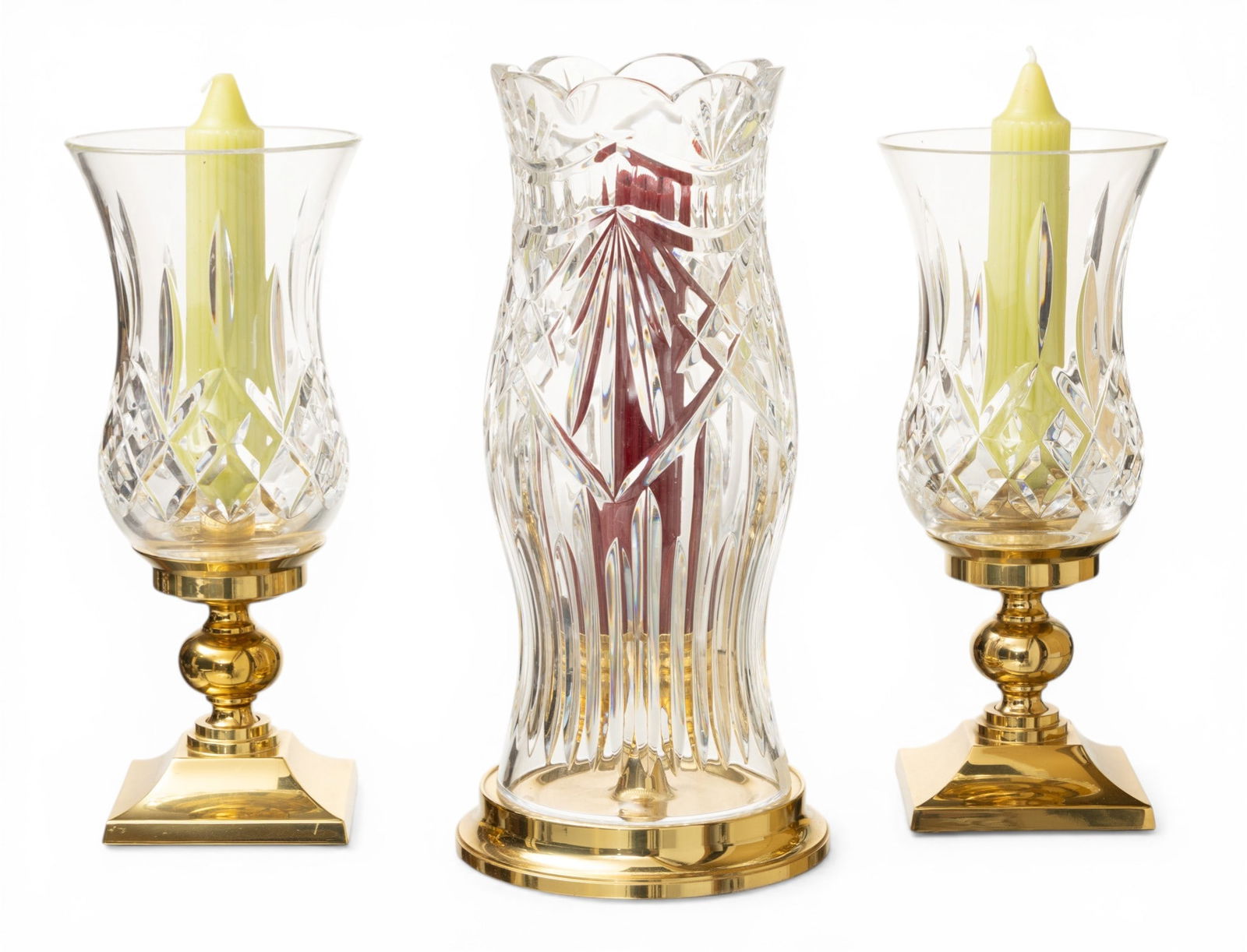 Waterford (Irish) Crystal Hurricane and Candlesticks H 12" Depth 5" 3 PCS: Waterford (Irish) Crystal Hurricane and Candlesticks H 12" Depth 5" 3 PCS (1.) Pair of Lismore crystal hurricane Lamps with brass bases. (2.) An America's Heritage' Thomas Jefferson crystal hurricane