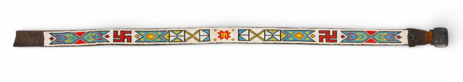 Navajo Beaded Leather Belt with Hickok Silverplate Buckle, 1920-30, W 1.25" L 32": Navajo Beaded Leather Belt with Hickok Silverplate Buckle, 1920-30, W 1.25" L 32" Multi-colored beads on a white field with geometric designs and whirling logs. Beaded panel stitched to the leather be