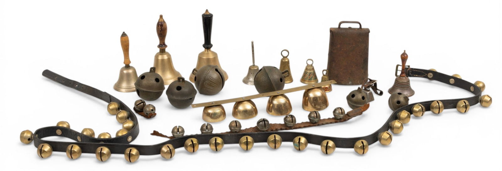 Collection of Brass and Wrought Iron Sleigh, Crotal, Cow and Handbells, 19th-20th C., 22 PCS: Collection of Brass and Wrought Iron Sleigh, Crotal, Cow and Handbells, 19th-20th C., 22 PCS Lot includes: (1.) Complete sleigh bell harness. Overall length of 84". Leather belt with numerous brass be