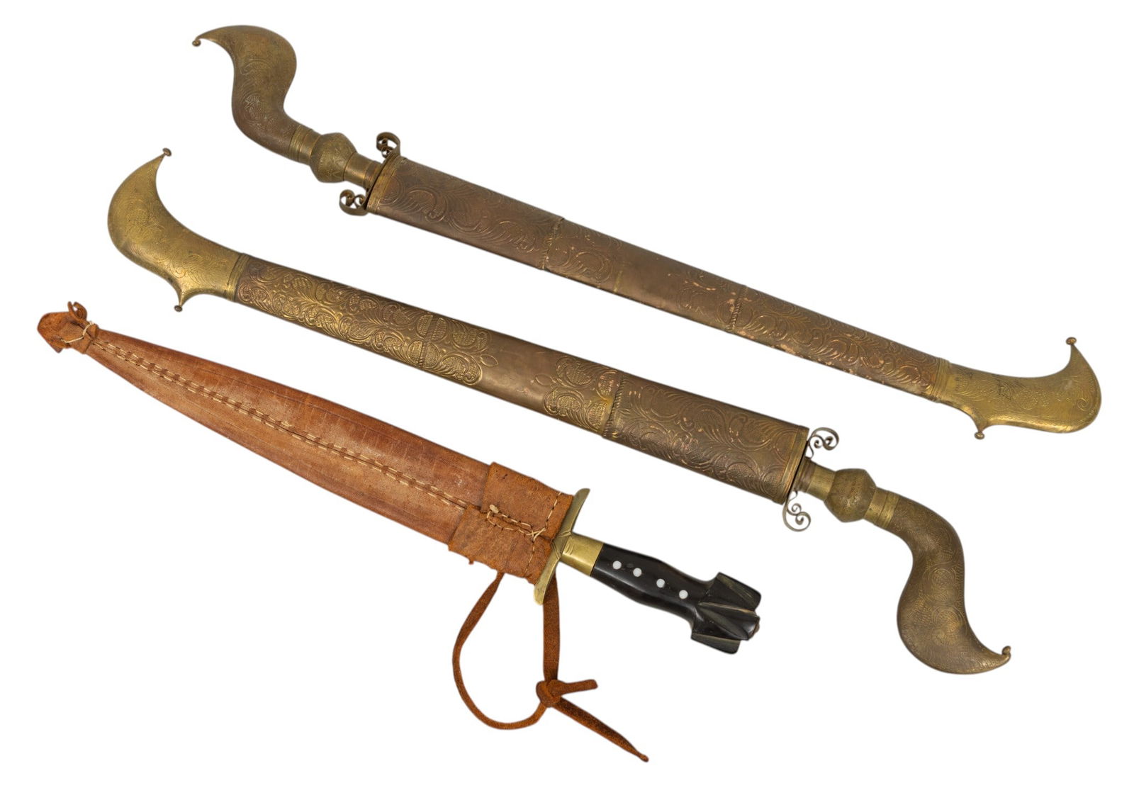 Collection of Filipino Kris Daggers, 20th C., 3 PCS: Collection of Filipino Kris Daggers, 20th C., 3 PCS Two matching Kris daggers, having hammer brass scabbards and handles. Wavy steel blades. Overall: L 27", W 4". One Kris dagger having a