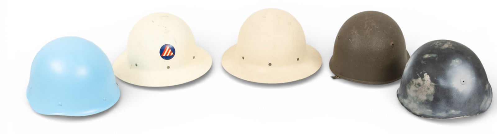 American, Swiss, Italian, and French Steel Helmets, 5 PCS: American, Swiss, Italian, and French Steel Helmets, 5 PCS Lot includes: (1.) Swiss M71 helmet. Painted olive drab. Leather, metal and foam liner. (2.) Pair of U.S. Civil Defense Air Raid Warden h