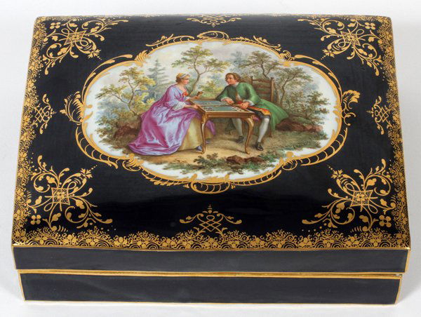 MEISSEN PORCELAIN BOX, L 8" X 6": MEISSEN PORCELAIN BOX, L 8" X 6":Under glaze blue crossed swords mark. Rectangular loose cover opens to divided interior for playing cards. Cobalt blue border. Courting scene at the cover. #H 21 incis