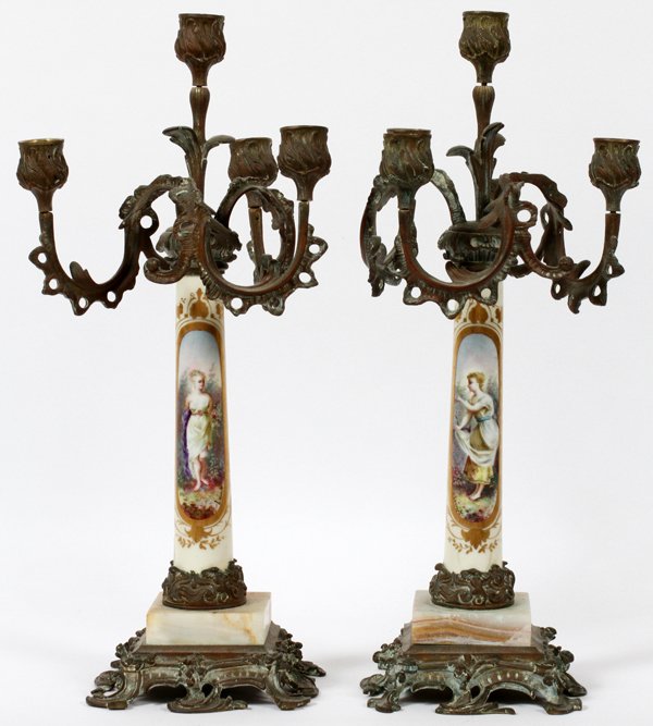 FRENCH CANDELABRA, 19TH C. PORCELAIN & METAL: FRENCH CANDELABRA, 19TH C., PAIR, H 17", PORCELAIN & METAL:Spelter candleholders and footed base. Porcelain shaft with hand painted scene signed Laurent. Height 17 3/4"