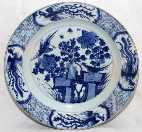 CHINESE BLUE & WHITE PORCELAIN CHARGER: CHINESE BLUE & WHITE PORCELAIN CHARGER, DIA 15 1/2":Floral well, diapered border with four reserves enclosing phoenix type bird, signed (see photo). From the Estate of Charles Chevalier, Mt Clemens, M