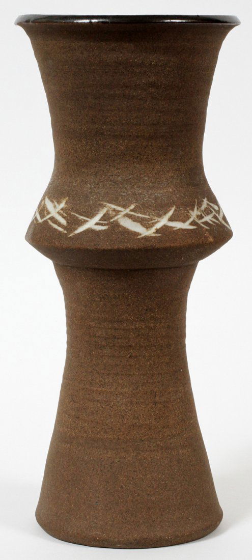 JOHN GLICK (1938-) POTTERY VASE, H 12": JOHN GLICK (1938-) POTTERY VASE, H 12":Inverted baluster form, brown glaze with white accents at the waist, signed at the underside.