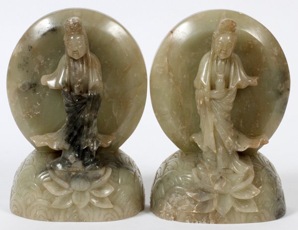 CHINESE SOAPSTONE GUANYIN FIGURAL BOOKENDS 6"H: CHINESE SOAPSTONE GUANYIN FIGURAL BOOKENDS, PAIR, H 6 1/2", W 4 1/2":Each carved as Guanyin standing on a lotus blossom, incised "Made in China" at the underside. From the Estate of Nellie Rhoades, Ha