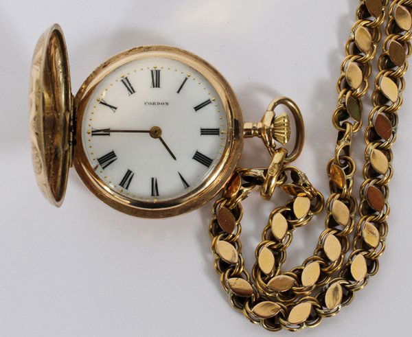 14 KT YELLOW GOLD CHAIN AND QUARTZ POCKET WATCH: 14 KT YELLOW GOLD CHAIN AND QUARTZ POCKET WATCH:Quartz watch "IA-2C". Tests 14 kt Original works were removed and replaced with quartz.