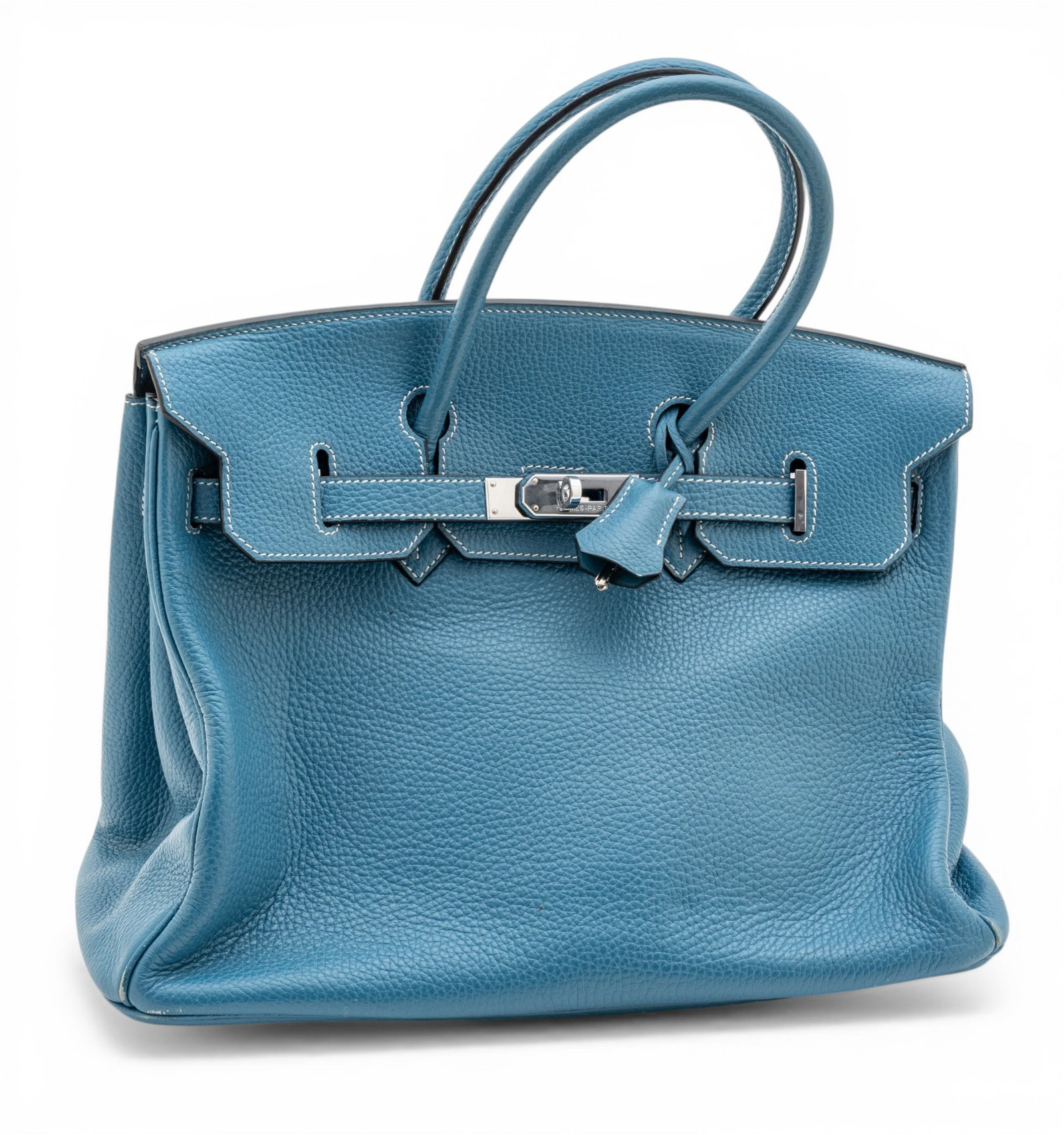 Hermès (French) Calfskin Leather in Bleu Jean Clemence, Ca. 2002, 'Birkin Handbag', H 11" W 14": Hermès (French) Calfskin Leather in Bleu Jean Clemence, Ca. 2002, 'Birkin Handbag', H 11" W 14" Depth 7.5" With Palladium hardware. Two interior pockets (one with zipper), Includes lock with keys