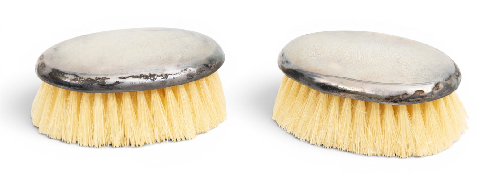Sterling Silver Baby Brushes W 2" L 3" 1 PAIR: Sterling Silver Baby Brushes W 2" L 3" 1 PAIR Bristles are good. Show no use. Provenance: Property from the Collection of Marianne Endicott, Grosse Pointe Shores, MI Dimensions: W 2" L 3" 1 PAIR