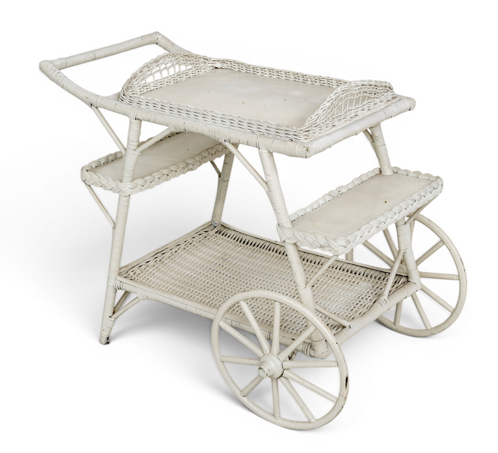 Painted Rattan Tea Trolly, H 29.5" W 27" L 36": Painted Rattan Tea Trolly, H 29.5" W 27" L 36" Two front wheels with two rear legs. Woven lower surface with two wood shelves. Wooden removeable tray with woven handles and gallery. Provenance: