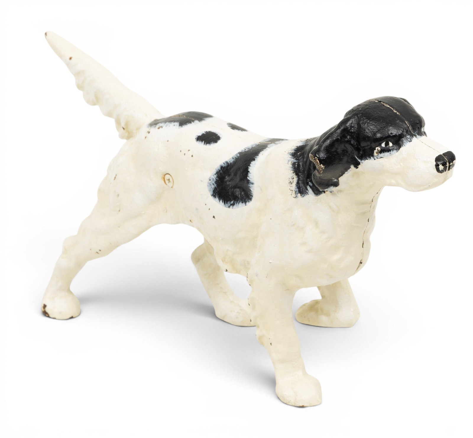 Hubley Manufacturing Company Patinated Cast Iron Door Stop 1950, 'Pointer', H 9" L 15": Hubley Manufacturing Company Patinated Cast Iron Door Stop 1950, 'Pointer', H 9" L 15" White with black accents. Provenance: Property from a Traverse City, MI private collector Dimensions: H 9"