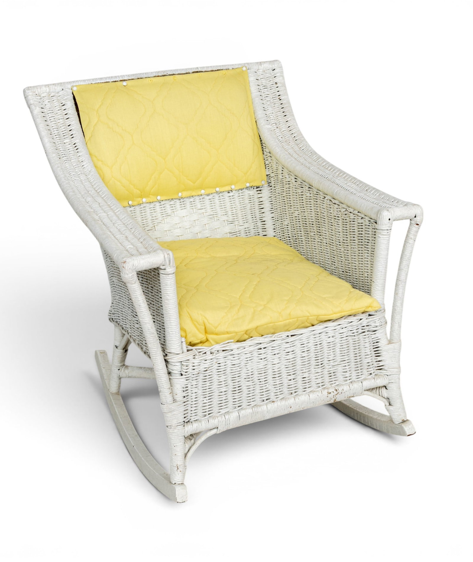Painted Rattan Rocking Chair, H 32.5" W 29" Depth 31.5": Painted Rattan Rocking Chair, H 32.5" W 29" Depth 31.5" Strait back with curved arms. Diamond accent at the backrest. Yellow upholstered seat and back cushions. Provenance: Property of a Grosse