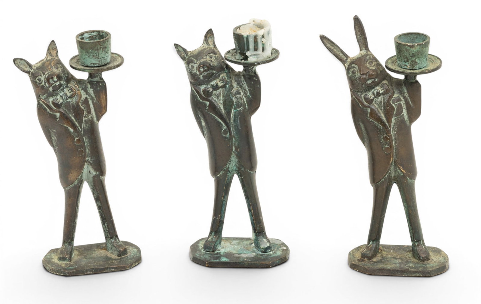 Bronze Animal Candlesticks H 7.5" W 3" Depth 2" 3 PCS: Bronze Animal Candlesticks H 7.5" W 3" Depth 2" 3 PCS Three bronze animal butler candlesticks. Two pigs and one rabbit. Provenance: Property from a Chicago, IL private collector Dimensions: H
