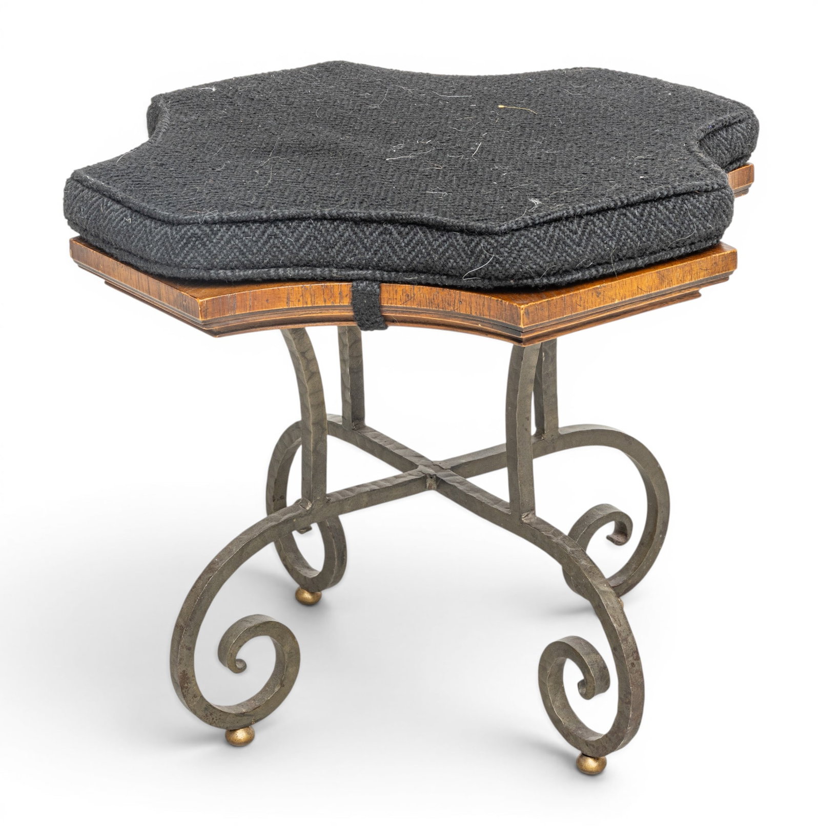 Iron Base Stool/low Table, H 18 ", W 21": Iron Base Stool/low Table, H 18 ", W 21" Covered with black wool cushion, has scroll form iron legs. Made by Grand Rapids manufacturer, possibly John Widdicomb. Provenance: Property from the Collectio