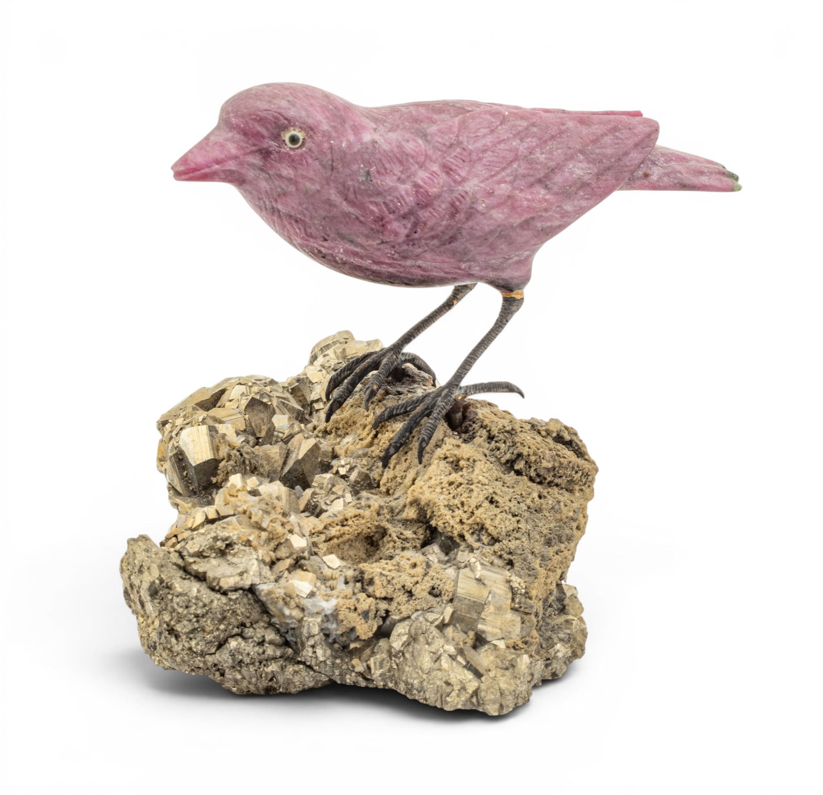Carved Rhodochrosite Miniature Bird on Pyrite H 1.75" L 4" 1 PC: Carved Rhodochrosite Miniature Bird on Pyrite H 1.75" L 4" 1 PC Mounted on pyrites. Provenance: Property from the Collection of Marianne Endicott, Grosse Pointe Shores, MI Dimensions: H 1.75" L 4" 1 P