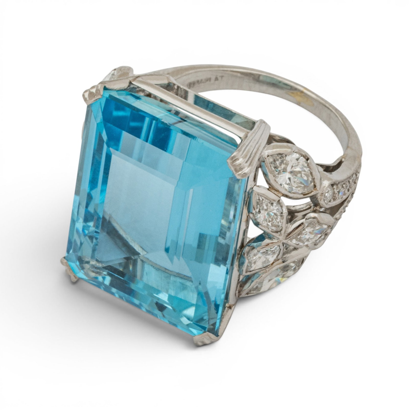 Platinum, 19ct Aquamarine and Diamond Ring Size 5.5 13.1 g: Platinum, 19ct Aquamarine and Diamond Ring Size 5.5 13.1 g A substantial cocktail ring having a large, emerald cut aquamarine with ten marquise diamond accents and round, single cut diamond melee down