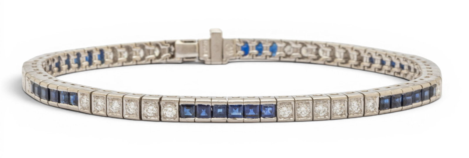 Platinum, Sapphire, and Diamond Line Bracelet L 7" 22.9 g: Platinum, Sapphire, and Diamond Line Bracelet L 7" 22.9 g A well-made, platinum line bracelet having alternating groups of round, brilliant diamonds and square faceted sapphires with a box clasp and s