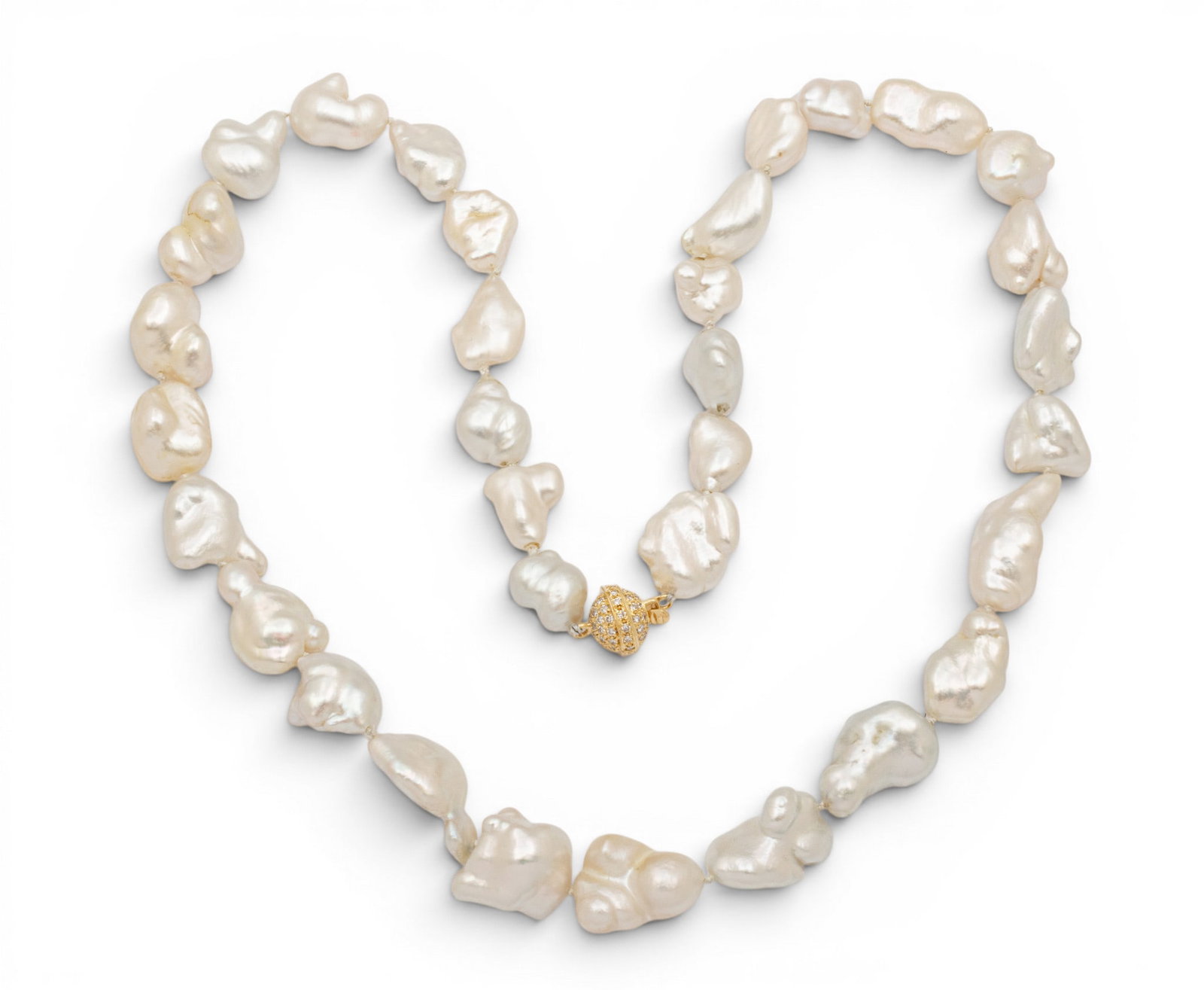 18k White Gold and Diamond Clasp, Biwa Pearl Necklace L 20" 46.8 g: 18k White Gold and Diamond Clasp, Biwa Pearl Necklace L 20" 46.8 g A strand of Biwa pearls as a necklace, knotted between each, having an 18k yellow gold and round, brilliant diamond melee pavé