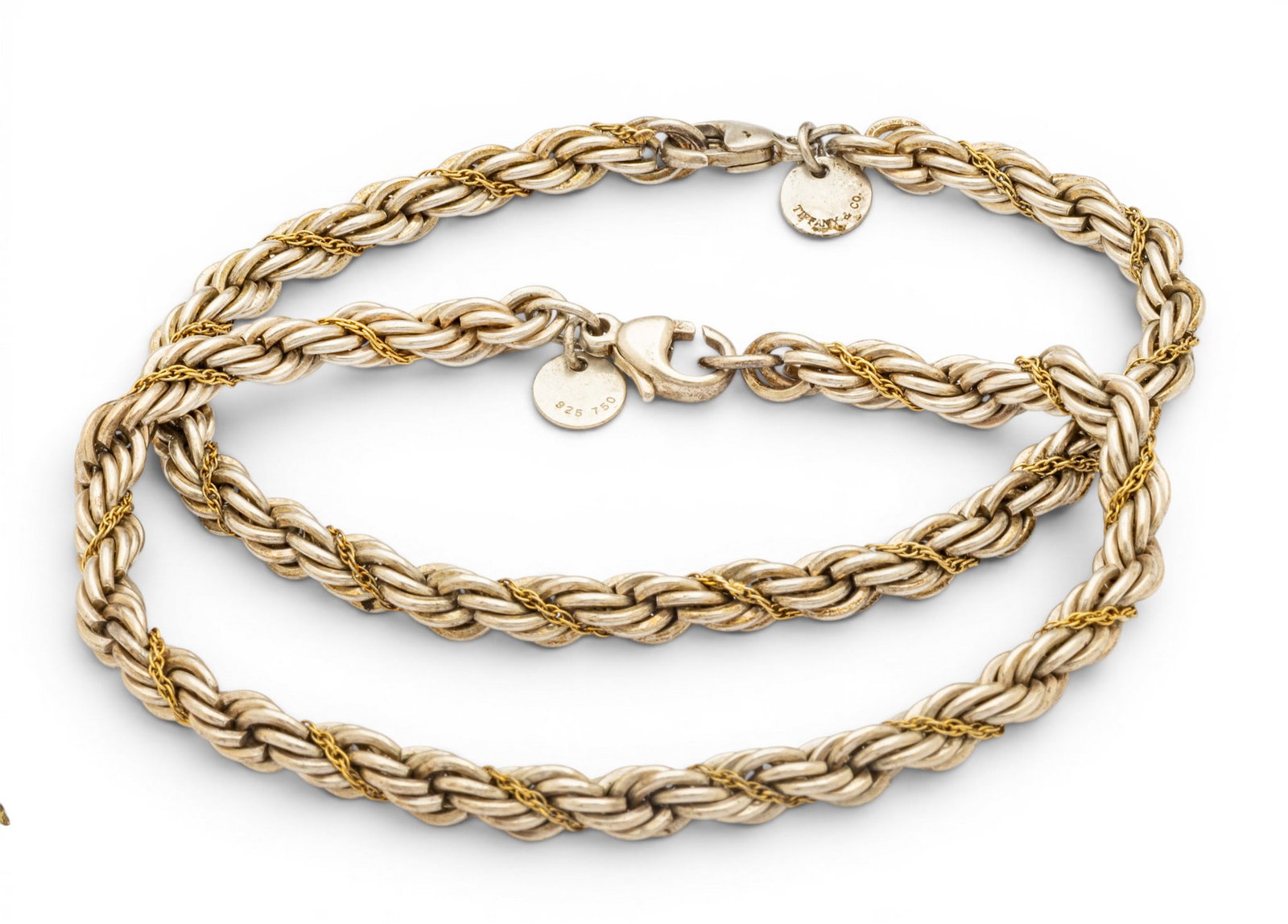 Sterling Silver and 18K Yellow Gold Rope Chain Bracelet, L 7" 1 PAIR: Sterling Silver and 18K Yellow Gold Rope Chain Bracelet, L 7" 1 PAIR Marked 925, 750 / Tiffany & Co. Includes Tiffany & Co. blue box and pouch. Provenance: From the Estate of Frank Isbey