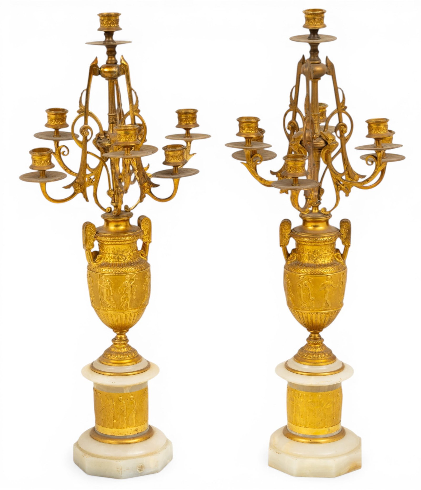 French Neoclassical Gilt Bronze, Gilt Metal and Onyx Candelabrum, Ca. 1840-60, H 25" W 11" 1 PAIR: French Neoclassical Gilt Bronze, Gilt Metal and Onyx Candelabrum, Ca. 1840-60, H 25" W 11" 1 PAIR A pair of French Bronze Neoclassical urns on pedestal bases Prominent vertical side handles terminate 