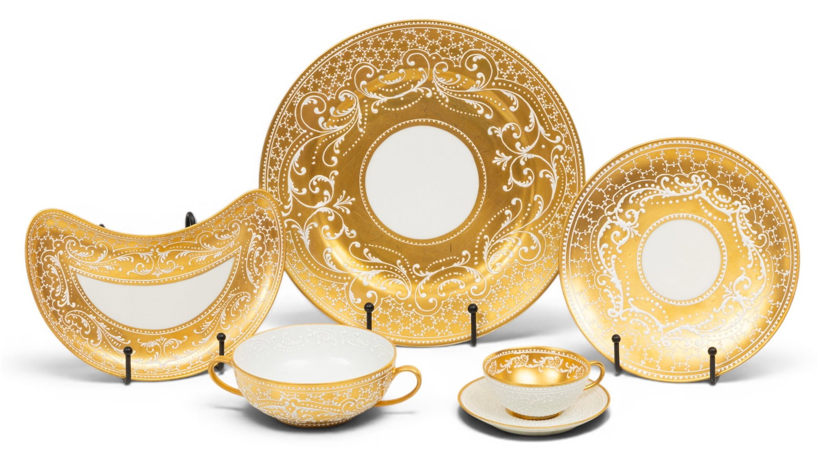 Atelier Le Tallec for Tiffany & Co (Paris) Porcelain Dinner Set for 8, Fired Gold and Enamel 1930,: Atelier Le Tallec for Tiffany & Co (Paris) Porcelain Dinner Set for 8, Fired Gold and Enamel 1930, 45 PCS All with white raised enamel decoration and fired gold interiors. 8 dinner plates @ 10", 8 cre