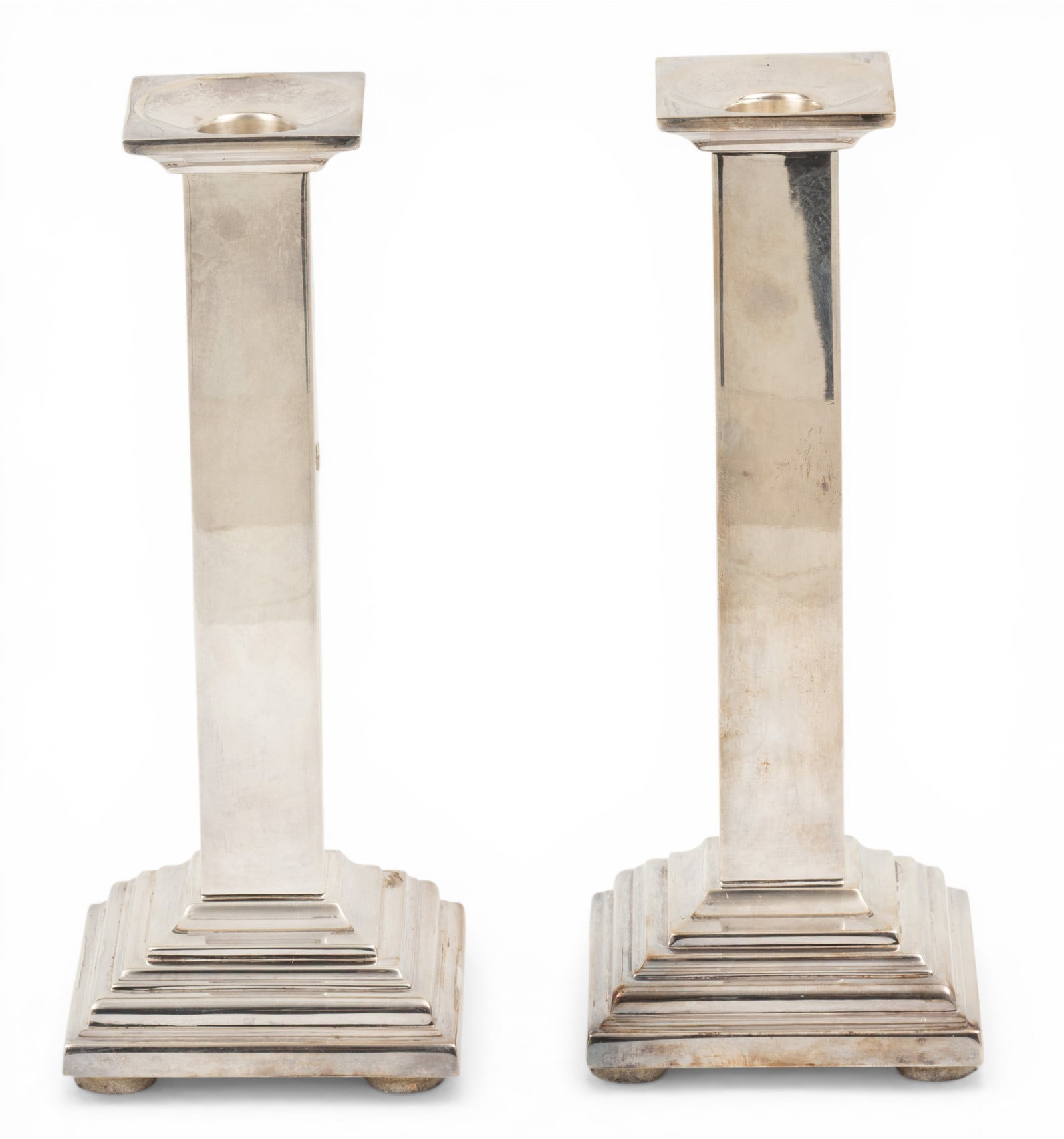 Pampaloni (Italian/Florence Est. 1902) Mid-Century Modern .925 Sterling Silver Candlesticks H 9.25": Pampaloni (Italian/Florence Est. 1902) Mid-Century Modern .925 Sterling Silver Candlesticks H 9.25" W 4" L 4" 1 PAIR A pair of Pampaloni weighted, sterling silver candlesticks. Each having a square co