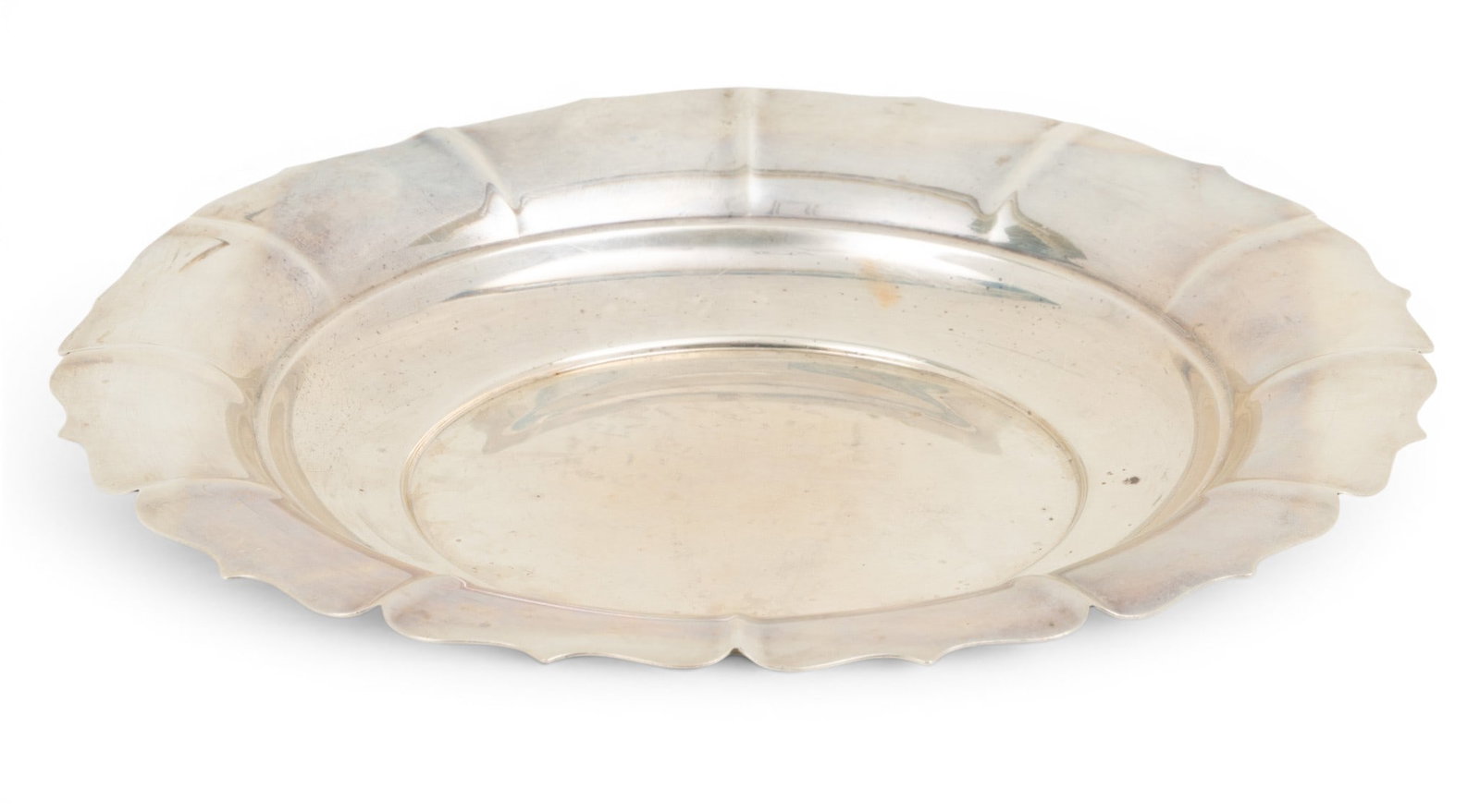 Plummer McCutcheon for the Webb C. Ball Company Sterling Silver Serving Dish '"Dublin" Pattern',: Plummer McCutcheon for the Webb C. Ball Company Sterling Silver Serving Dish '"Dublin" Pattern', Dia. 10" 13 t oz With a scalloped edge. No inscriptions or monograms. #75. Provenance: Property from th